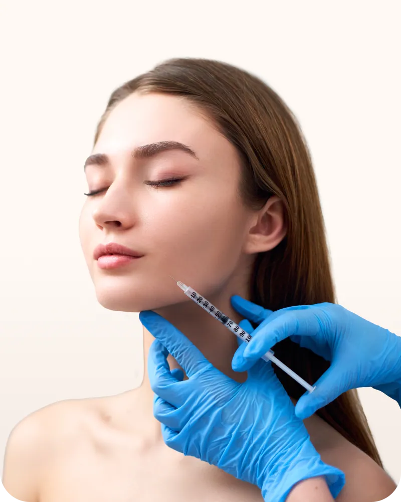 Woman receiving a dermal filler injection