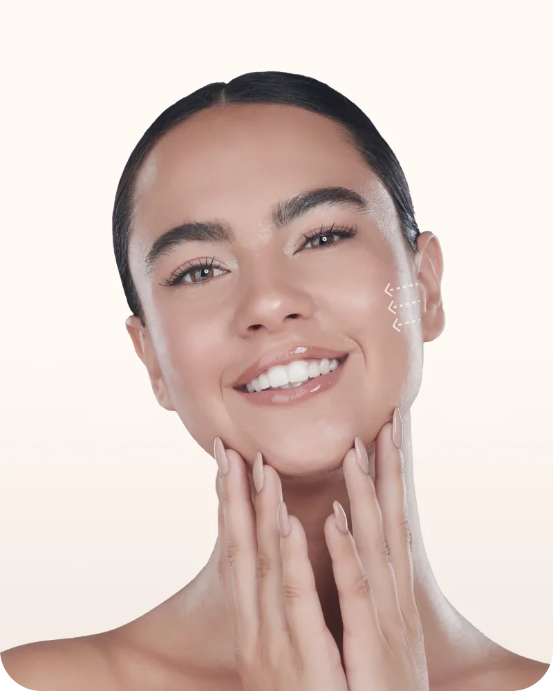 Smiling woman with her hands on her face, otoplasty