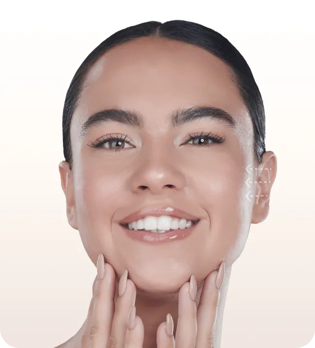 Smiling woman with her hands framing her face